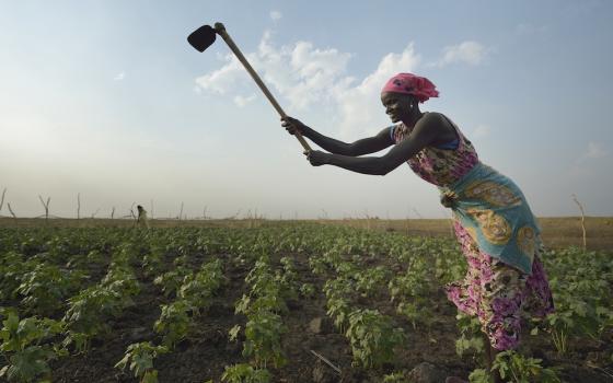 A woman works in a community garden in South Sudan in 2017. (CNS photo/Paul Jeffrey)